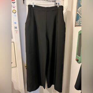 Vixen- size XL- black Vacation pants, zip back. Some snags. NWT.
